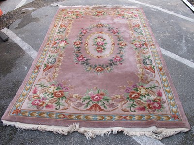 Lot 1616 - Wool Carpet, with floral decoration, tasstle...