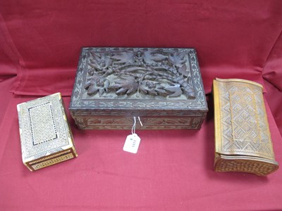 Lot 1411 - Two wooden carved boxes the largest with...