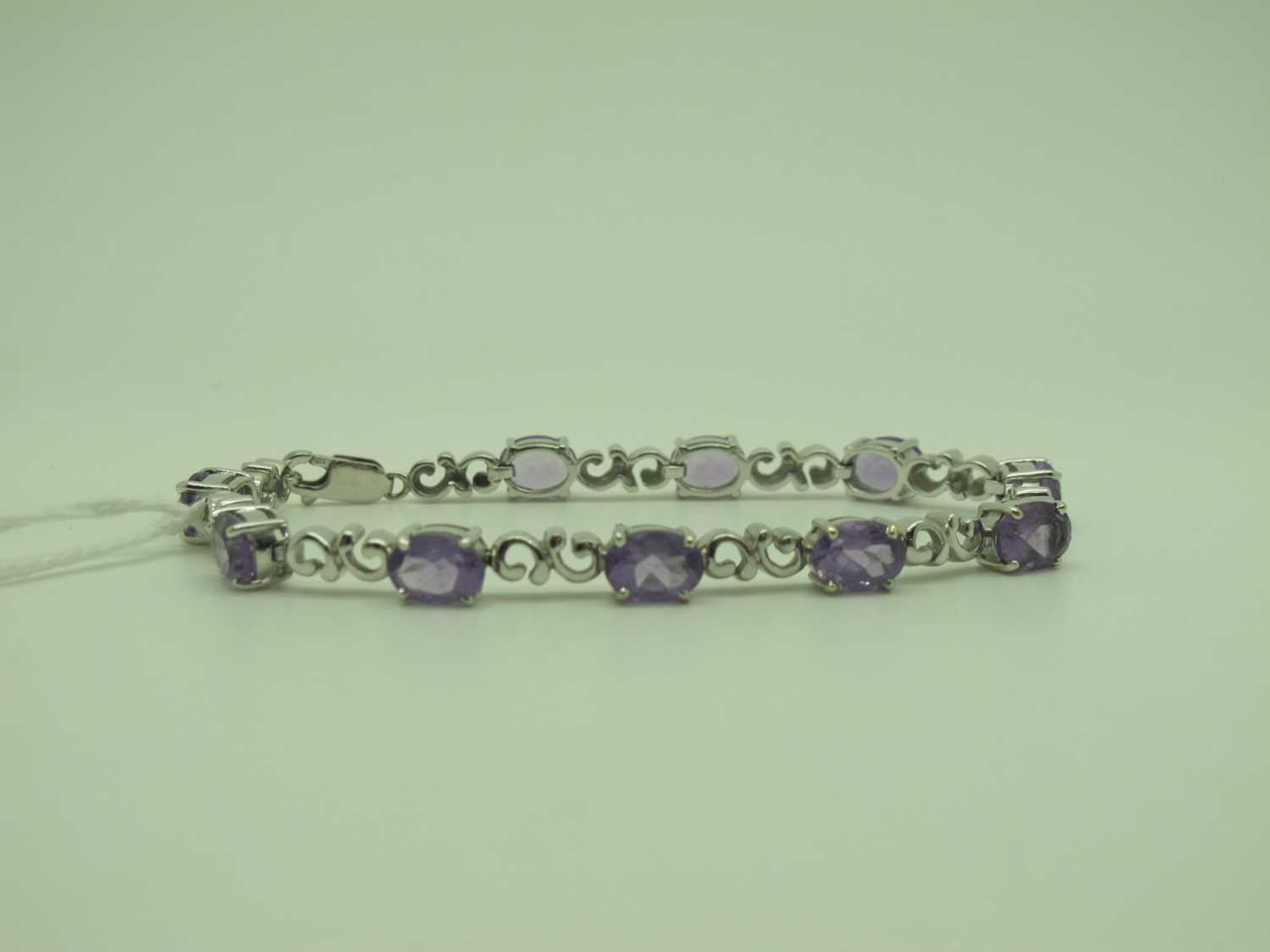 Lot 237 - A Modern Gems TV 9ct White Gold Bracelet, the...