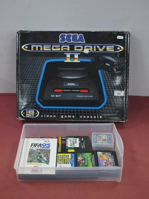 Lot 328 - A Boxed Sega Megadrive II 16-Bit Games Console,...