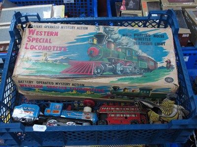 Lot 483 - A battery operated tinplate toy Western...