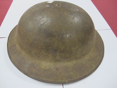 Lot 764 - WWI British Army Brodie Mk I steel helmet with...