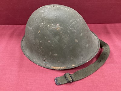 Lot 773 - British Army steel 'turtle' Mk 4 combat helmet...