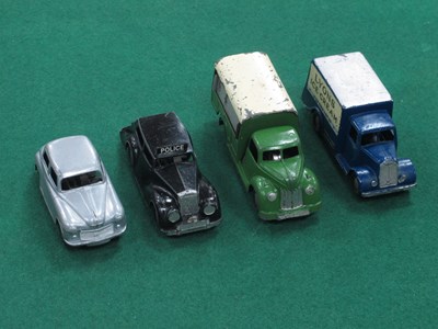 Lot 571 - Four Mid XX Century Clockwork Diecast Vehicles...