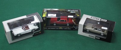 Lot 557 - Three 1:43rd Scale Diecast Model Cars...