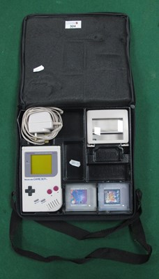 Lot 324 - A Nintendo Game Boy Hand Held Games Console,...