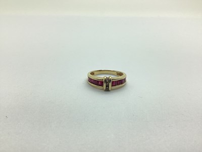 Lot 227 - A Modern Ruby and Diamond Set Dress Ring,...