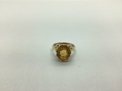 Lot 219 - A 9ct Gold Single Stone Dress Ring, oval claw...