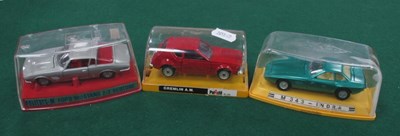 Lot 603 - Three Cased 1:43rd Scale Diecast Model Cars...