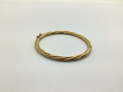 Lot 192 - A Modern Ropetwist Style Hinged Bangle, to...