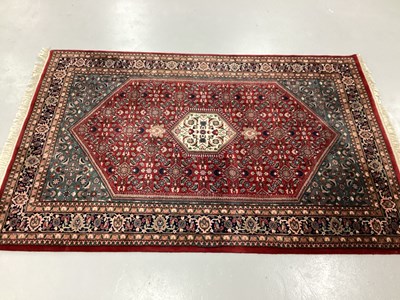 Lot 1484 - XX Century Persian Style Wool Patterned Carpet,...