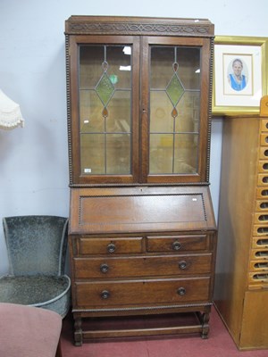 Lot 1490 - 1930s Oak Bureau Bookcase, the top with glazed...