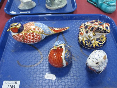 Lot 1184 - Four Royal Crown Derby Paperweights - pheasant,...