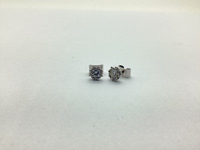 Lot 211 - A Pair of Single Stone Diamond Earstuds, the...