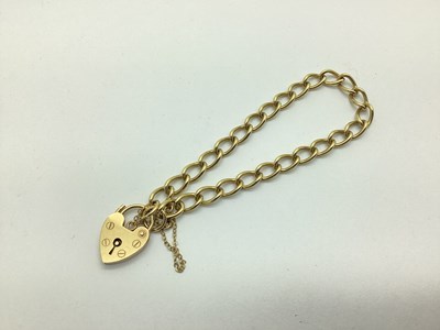 Lot 212 - A 9ct Gold Curb Link Bracelet, to 9ct gold...