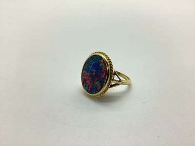 Lot 223 - An 18ct Gold Black Opal Doublet Single Stone...