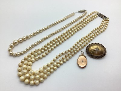 Lot 198 - A Victorian Pearl Set Oval Locket Back Brooch,...