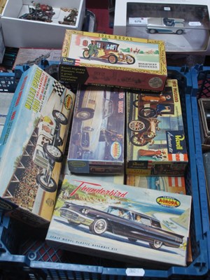 Lot 576 - Eight Boxed Plastic Model Car Kits by Aurora,...