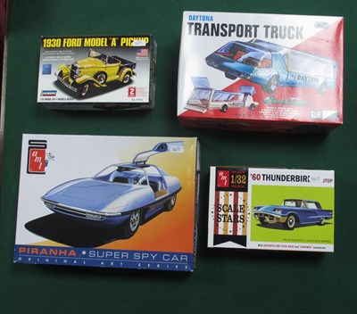 Lot 419 - Four Plastic Model Car Kits by AMT, Lindberg,...