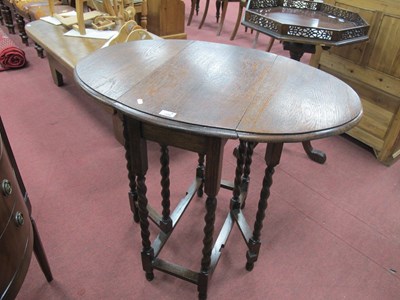 Lot 1498 - 1930 Oak Gate Leg Table, with drop leaves, on...