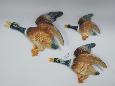 Lot 1181 - Falcon ware, a set of three graduated mallard...