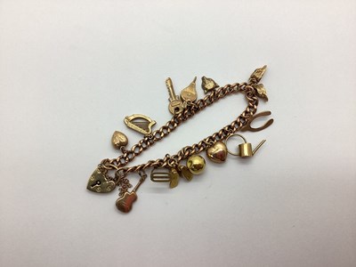 Lot 184 - A 9ct Gold Curb Link Charm Bracelet, to heart...