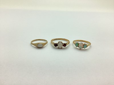 Lot 208 - A 9ct Gold Three Stone Opal Ring, (opal...