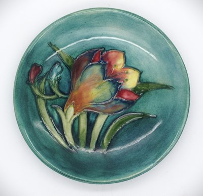 Lot 1324 - A Moorcroft 'Freesia' dish 11.5cm d.