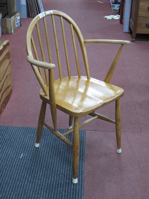 Lot 1518 - Ercol Lightwood Spindle Back Armchair,...