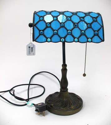 Lot 1435 - A bankers table lamp with blue Tiffany style...