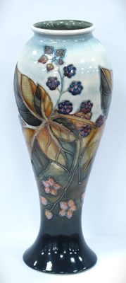 Lot 1171 - A Moorcroft inverted baluster vase decorated...