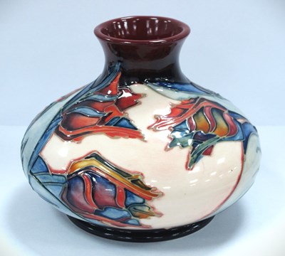 Lot 1247 - A Moorcroft small squatted vase decorated in...