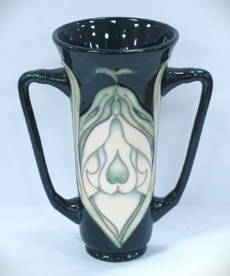 Lot 1275 - A Moorcroft loving cup decorated in the...