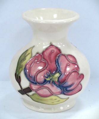 Lot 1276 - A Moorcroft vase decorated in the 'Magnolia'...