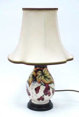 Lot 1153 - A Moorcroft table lamp decorated in the 'Anna...