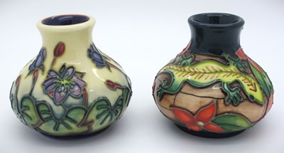 Lot 1325 - Two Moorcroft miniature squat vases one...