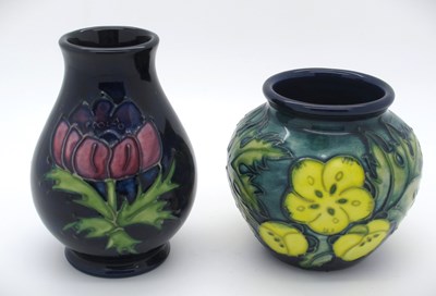 Lot 1327 - Two Moorcroft vases one decorated in the...