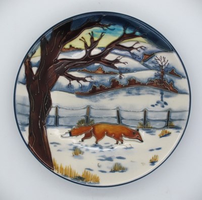 Lot 1319 - A Moorcroft pin dish decorated in the...