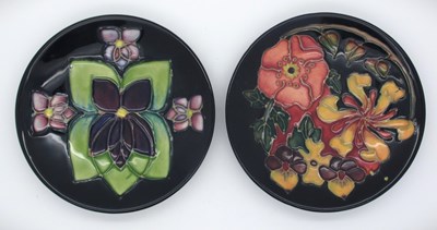 Lot 1323 - Two Moorcroft Pin Dishes, 'Violet' pattern...