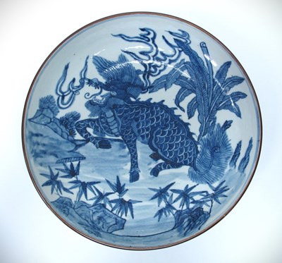 Lot 1354 - A Chinese blue and white charger depicting a...