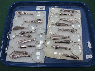 Lot 1402 - Magnifying glasses with plated handles - One...