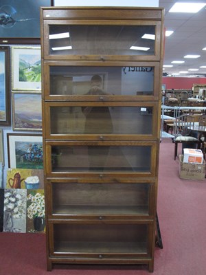 Lot 1502 - Gunn Oak Six High Sectional Bookcase, on block...