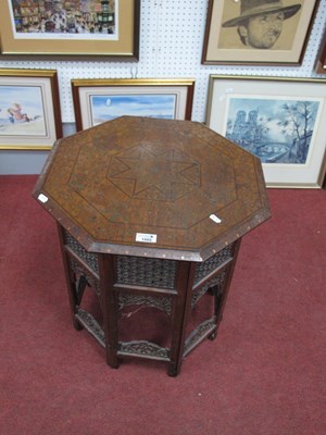 Lot 1503 - XX Century hardwood Octagonal shaped table on...