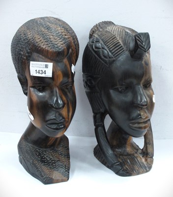 Lot 1434 - Two Carved African Female Heads, the tallest...