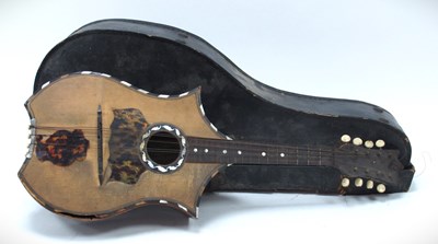 Lot 1383 - A XIX Century Mandolin, with rosewood back and...