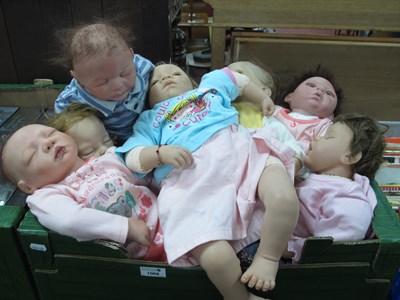 Lot 1068 - A collection of realistic baby dolls to...