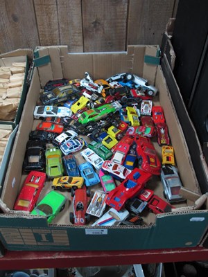 Lot 1063 - A box of racing themed diecast cars comprising...