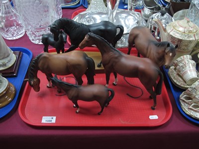 Lot 1330 - Beswick Horse and Foal in black matt, on an...