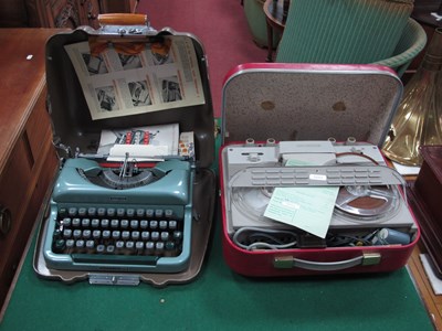 Lot 1149 - A cased Imperial portable typewriter together...