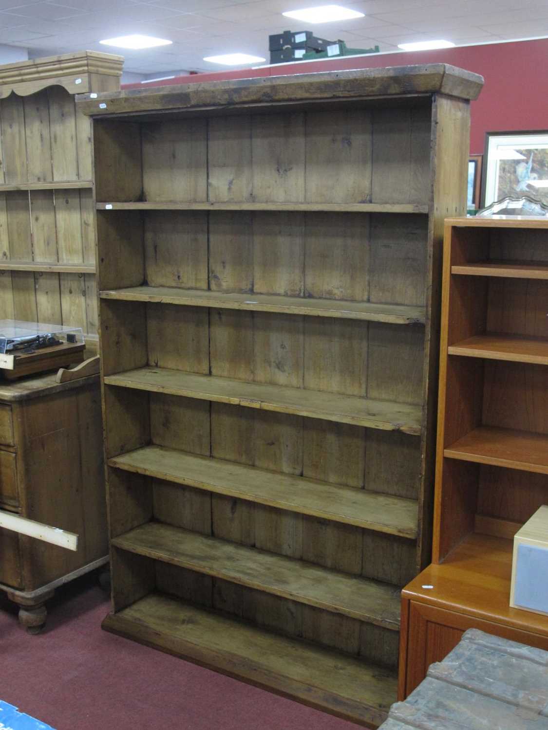 Lot 1509 - Pine bookcase with five shelves on a plinth...